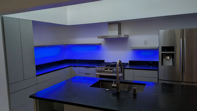 metal floating shelves on kitchen with blue lighting