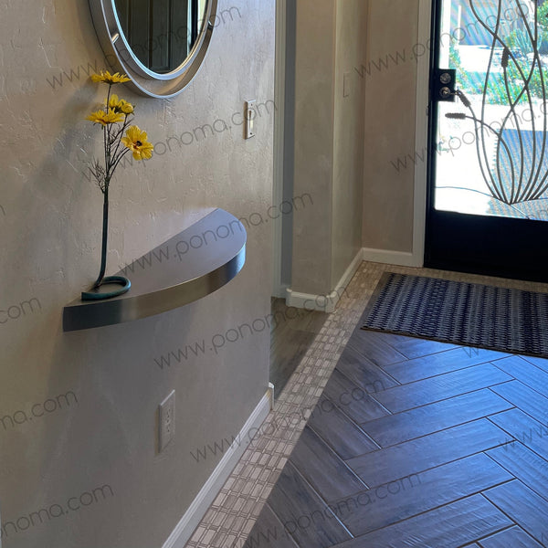 curved steel shelf in lobby