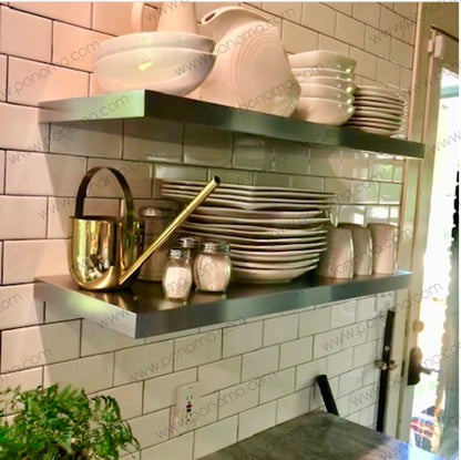 two metal shelves with a lot of plates