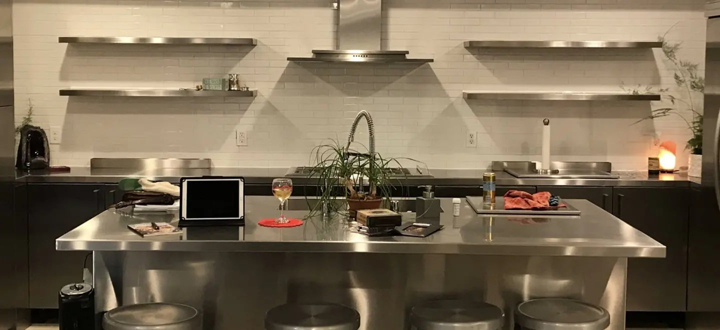 Modern kitchen with stainless steel island and appliances