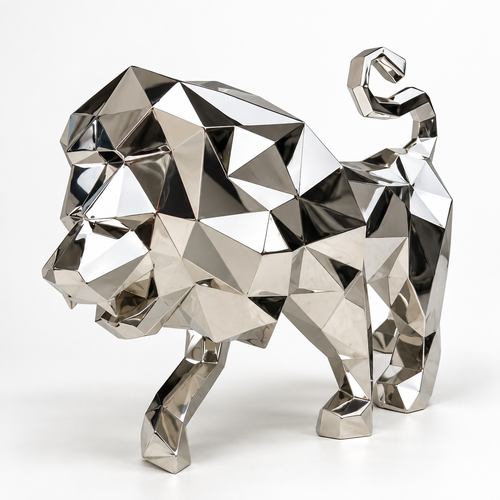 A geometric lion sculpture made of reflective metallic silver facets, shown in profile on a clean white studio background.